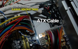 Attaching the PSU to the motherboard with ATX cables